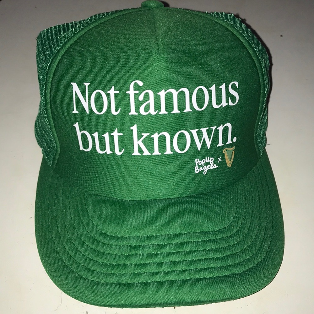 Not Famous But Known Green Trucker Hat by PopUp Bagels & Guinness